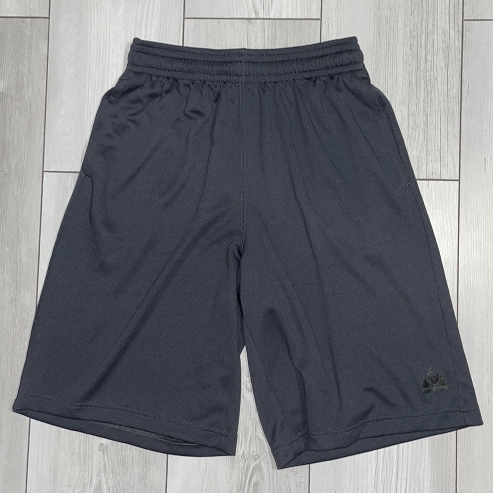 Above the rim dark grey athletic material men’s basketball shorts size small